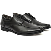 Close-up view of Country Maddox black leather shoe highlighting crocodile print.